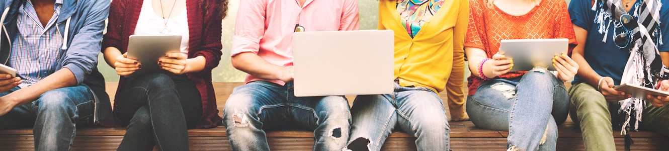 A group of young people on mobile devices