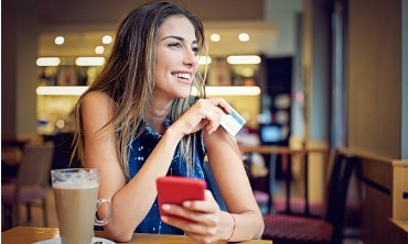 Young woman with credit card